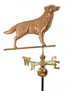 Weather vane of golden retriever made from polished copper